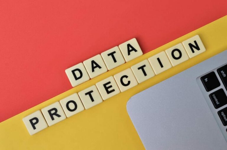 Data protection blocks and keyboard representing pseudonymisation controls and key separation.