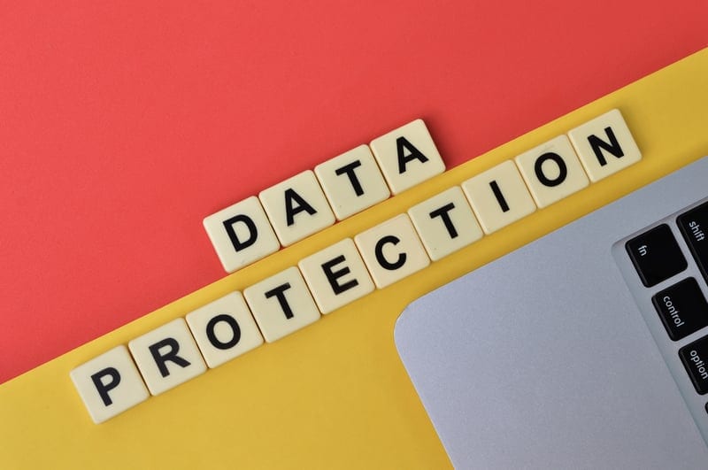 Data protection blocks and keyboard representing pseudonymisation controls and key separation.