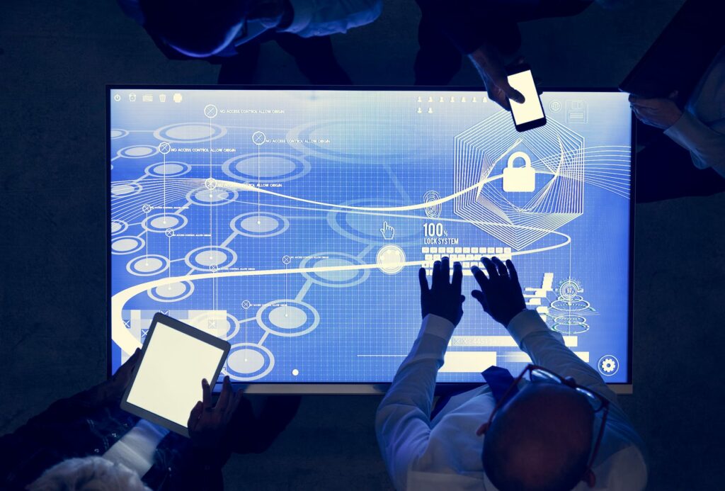 Privacy and security team comparing biometric, card, PIN and device access options for a workplace DPIA.