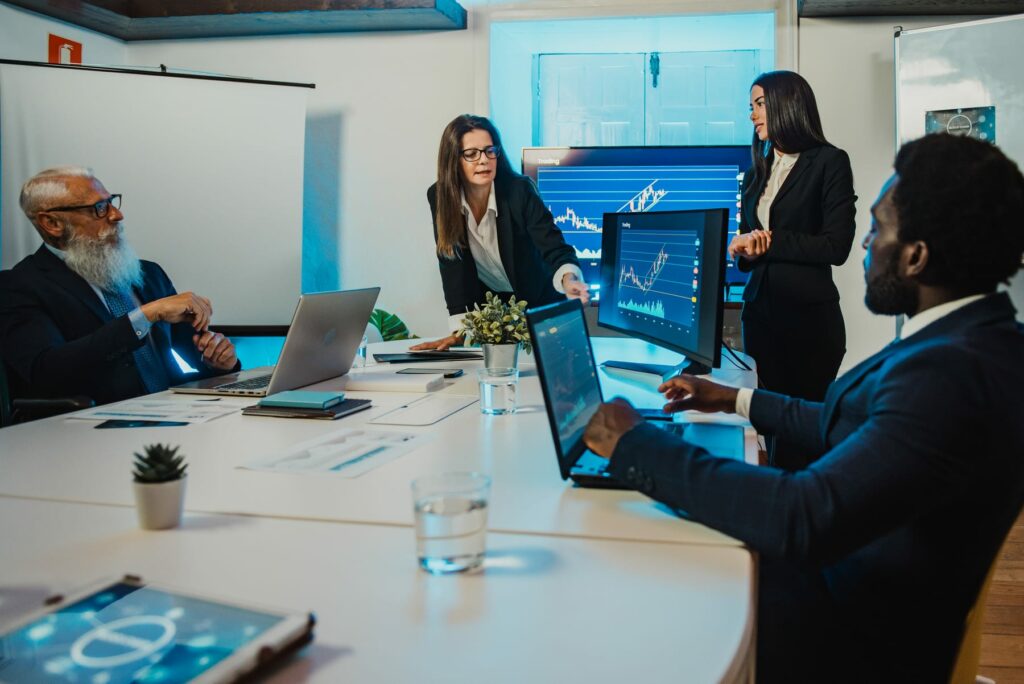 Privacy, security and procurement colleagues reviewing data analysis during cloud AI vendor due diligence.