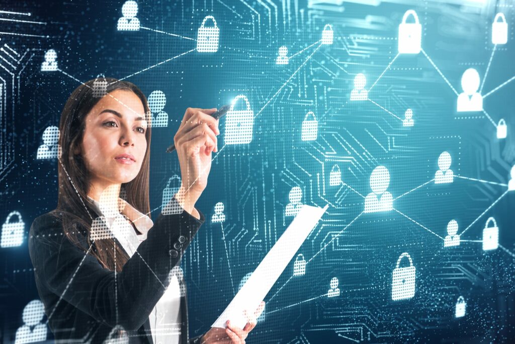 Professional reviewing digital security controls for privacy-preserving data use in AI systems.