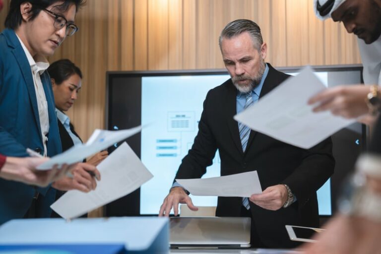 Privacy and governance team reviewing regulator report findings and evidence records.