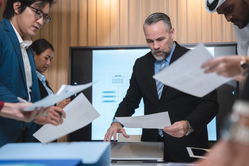 Privacy and governance team reviewing regulator report findings and evidence records.