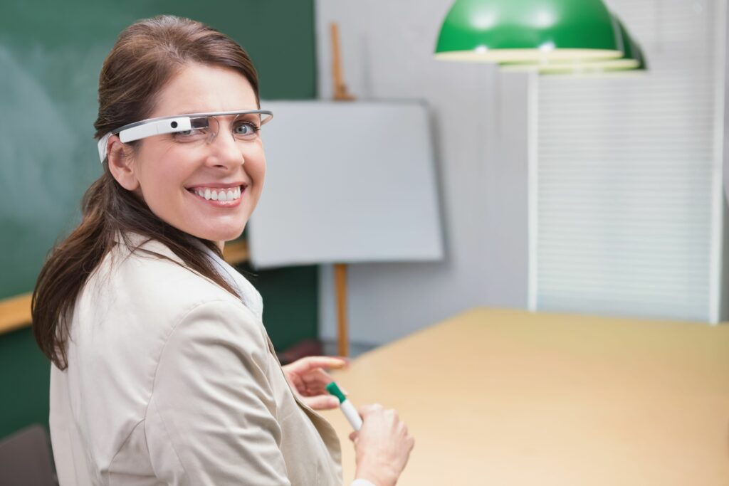 Woman wearing smart glasses in a workplace training room