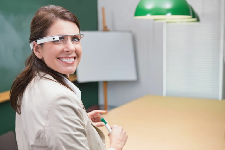 Woman wearing smart glasses in a workplace training room
