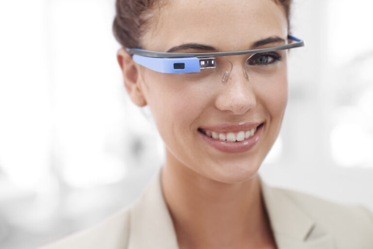 Professional wearing camera-enabled smart glasses in a workplace
